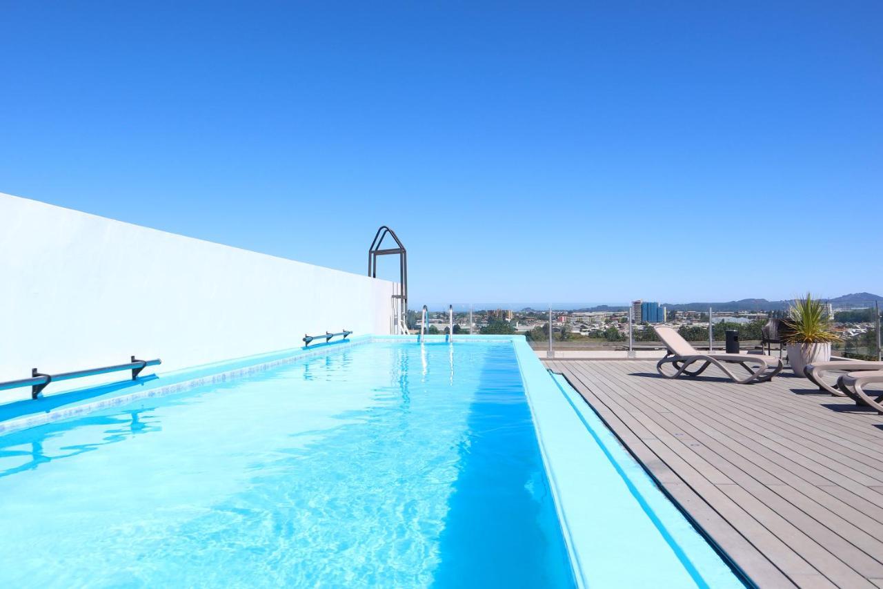 Hotel Wyndham Concepcion Pettra Exteriér fotografie Rooftop pool
