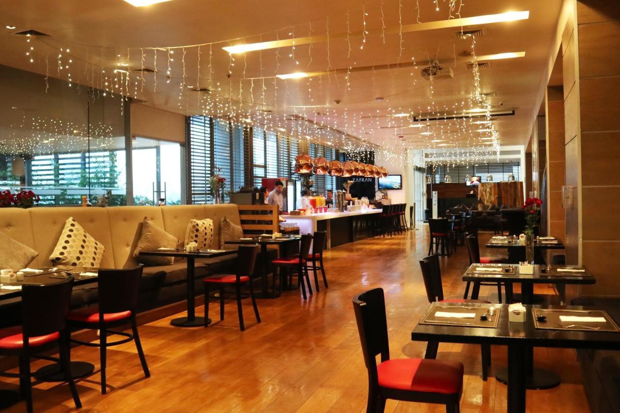 Hotel Wyndham Concepcion Pettra Exteriér fotografie The interior of the restaurant